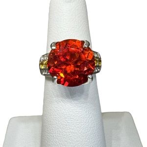 Vintage ring with red/orange center stone